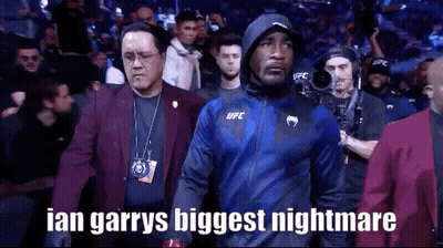 Man In Blue Jacket Leaving Boxing Ring GIF