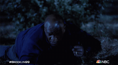 Man In Blue Jacket Lying On Ground Brooklyn99 GIF