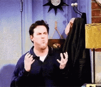Man In Blue Jacket Making Funny Face GIF