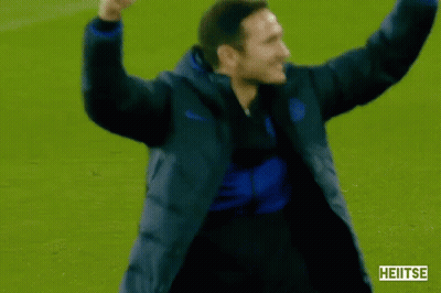 Man In Blue Jacket Raising Arms GIF