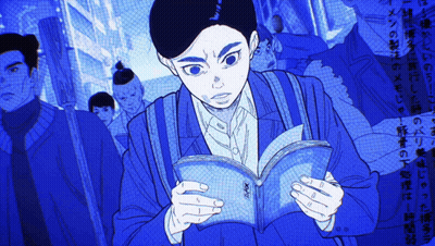 Man In Blue Jacket Reading Foreign Language Book GIF