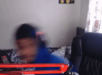 Man In Blue Jacket Rubbing Lotion On Hands GIF