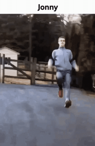 Man In Blue Jacket Running Jonny GIF