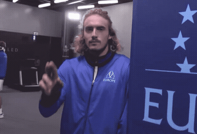 Man In Blue Jacket Saying Europe Giving Peace Sign GIF