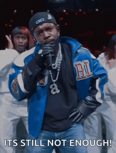 Man In Blue Jacket Singing Into Microphone Says It's Still Not Enough GIF