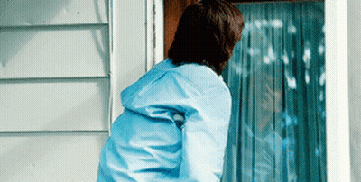 Man In Blue Jacket Standing GIF