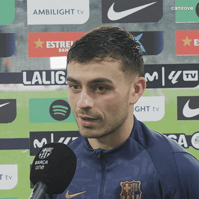 Man In Blue Jacket Talking Into Microphone GIF