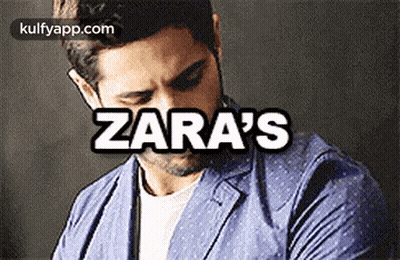 Man In Blue Jacket Talking On Cell Phone Zara's GIF