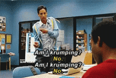 Man In Blue Jacket Talking To Man At Desk GIF