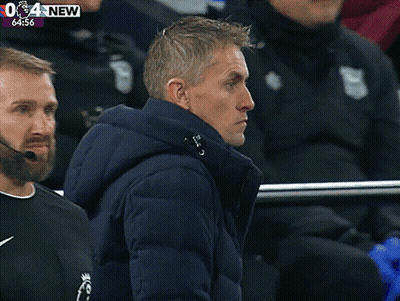 Man In Blue Jacket Watching Soccer Game 64:57 GIF