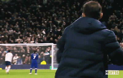 Man In Blue Jacket Watching Soccer Player Number 7 GIF