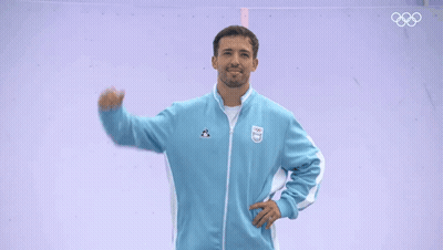Man In Blue Jacket With Argentina Logo GIF