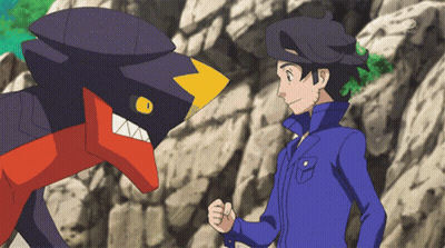Man In Blue Jacket With Cartoon Character GIF