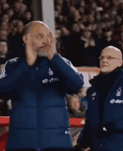 Man In Blue Jacket With E-On On Front GIF