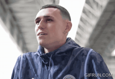 Man In Blue Jacket With Manchester GIF