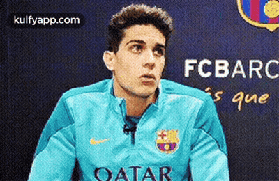 Man In Blue Jacket With Qatar GIF