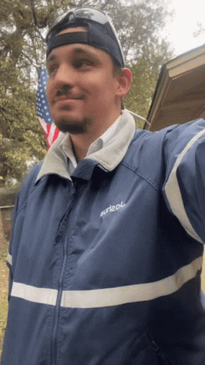 Man In Blue Jacket With Surleol GIF