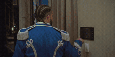 Man In Blue Jacket With White Trim GIF