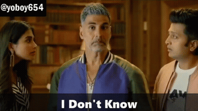 Man In Blue Jacket With Woman And Man In Purple GIF