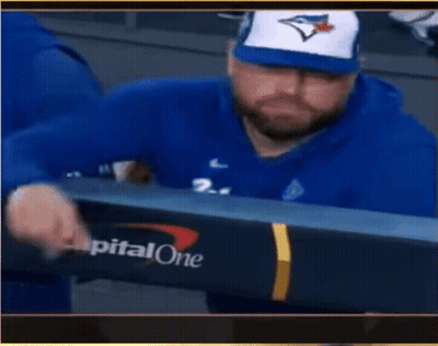 Man In Blue Jays Hat Waving GIF