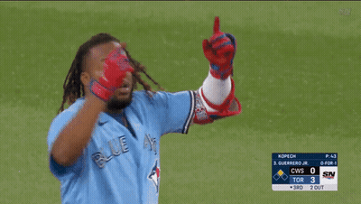 Man In Blue Jays Jersey Arms Up GIF