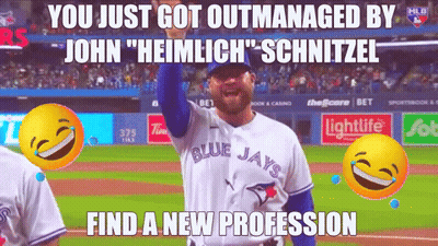 Man In Blue Jays Jersey Holding Hand Up GIF