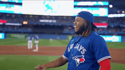 Man In Blue Jays Jersey On Baseball Field GIF