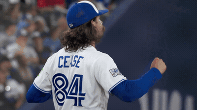 Man In Blue Jays Jersey On Baseball Field GIF