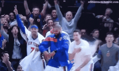 Man In Blue Jersey Dancing Before Crowd GIF