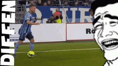 Man In Blue Jersey Kicking Soccer Ball GIF