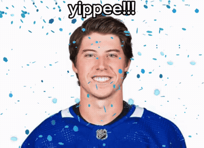 Man In Blue Jersey With Confetti Says Yippee GIF