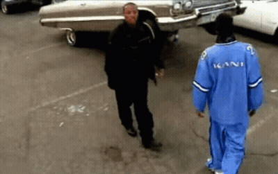 Man In Blue Kani Jacket Next To Man In Black Jacket GIF