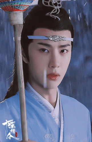Man In Blue Kimono And Chinese Writing Headband GIF