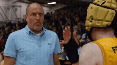 Man In Blue Lacoste Shirt Talking To Another Man GIF
