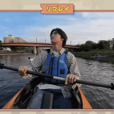 Man In Blue Life Vest Paddling Kayak GIF