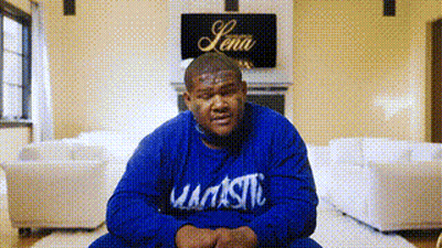 Man In Blue Majestic Sweatshirt Sitting On Floor GIF
