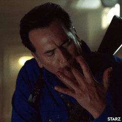 Man In Blue Must've Think His Fingers Taste Like Hotdog GIF