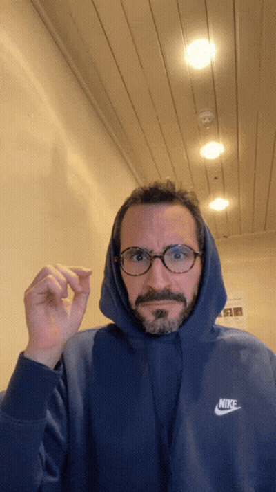 Man In Blue Nike Hoodie Surprised GIF