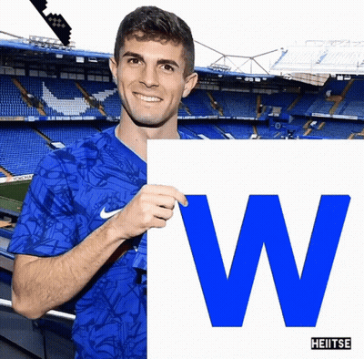 Man In Blue Nike Shirt Holding Sign W GIF