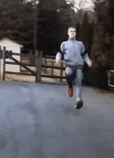 Man In Blue Nike Tracksuit Running GIF