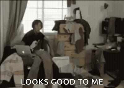 Man In Blue Overalls Holding Mop GIF