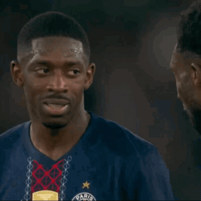 Man In Blue Paris Shirt Talking To Another GIF
