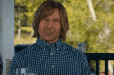 Man In Blue Plaid Shirt Smiling GIF