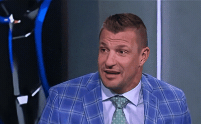 Man In Blue Plaid Suit Making A Face GIF
