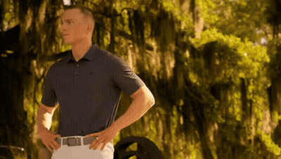 Man In Blue Polo Shirt Hands On Hips GIF