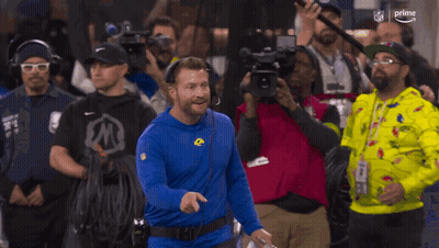 Man In Blue Rams Jersey In Front Of Crowd GIF