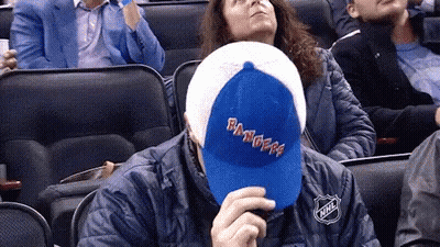 Man In Blue Rangers Hat At Stadium GIF
