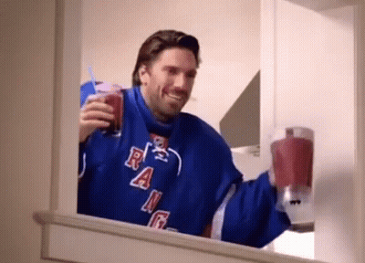 Man In Blue Rangers Jersey Drinking Smoothie GIF