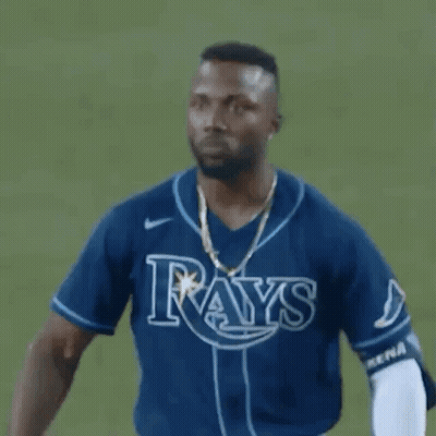 Man In Blue Rays Jersey And Gold Chain GIF