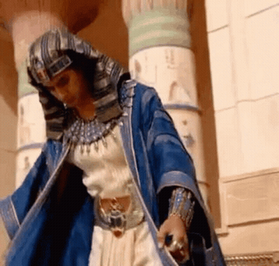 Man In Blue Robe And Hat GIF